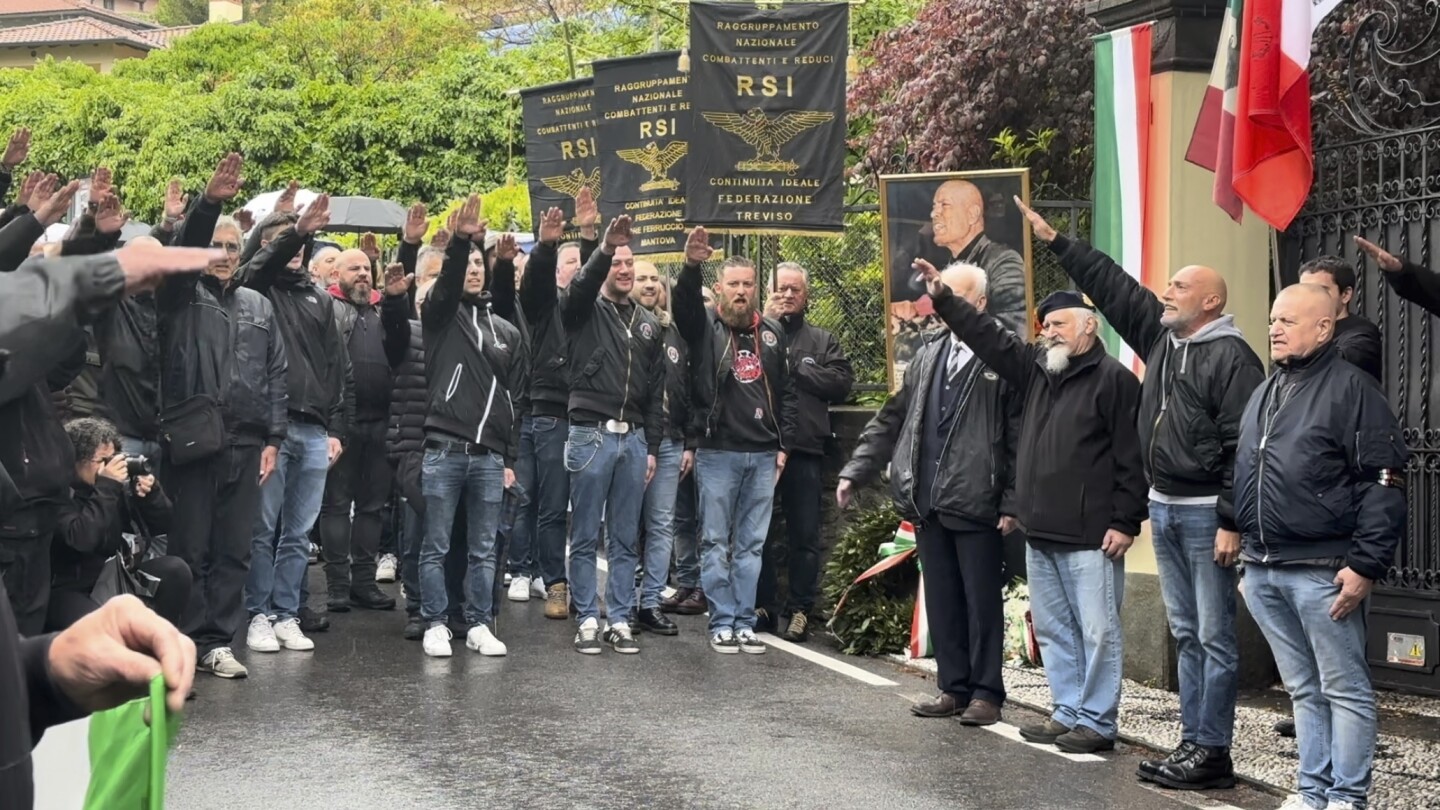 Dozens in Italy give a fascist salute on the anniversary of Mussolini’s execution