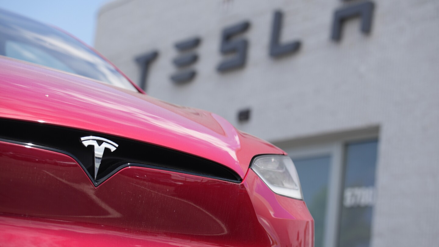 Tesla’s stock leaps on reports of Chinese approval of driving software