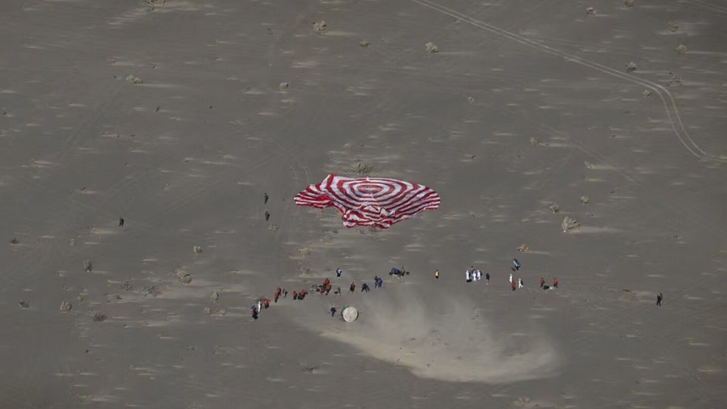 Chinese astronauts return to earth after six months in space