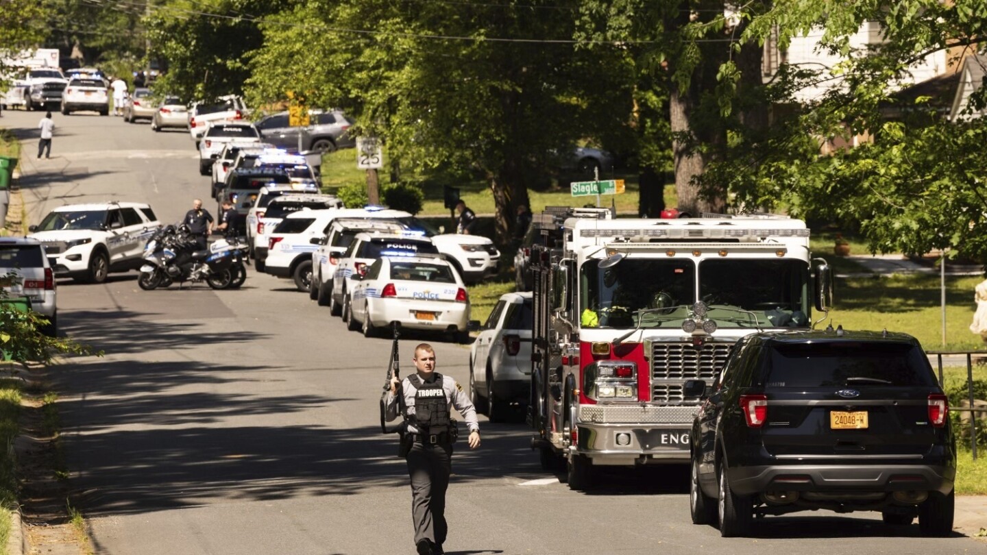 Shootout that killed 4 law officers began as task force tried to serve a warrant, police say