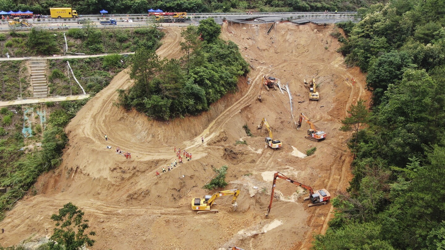 Death toll jumps to at least 48 as the search continues in southern China highway collapse