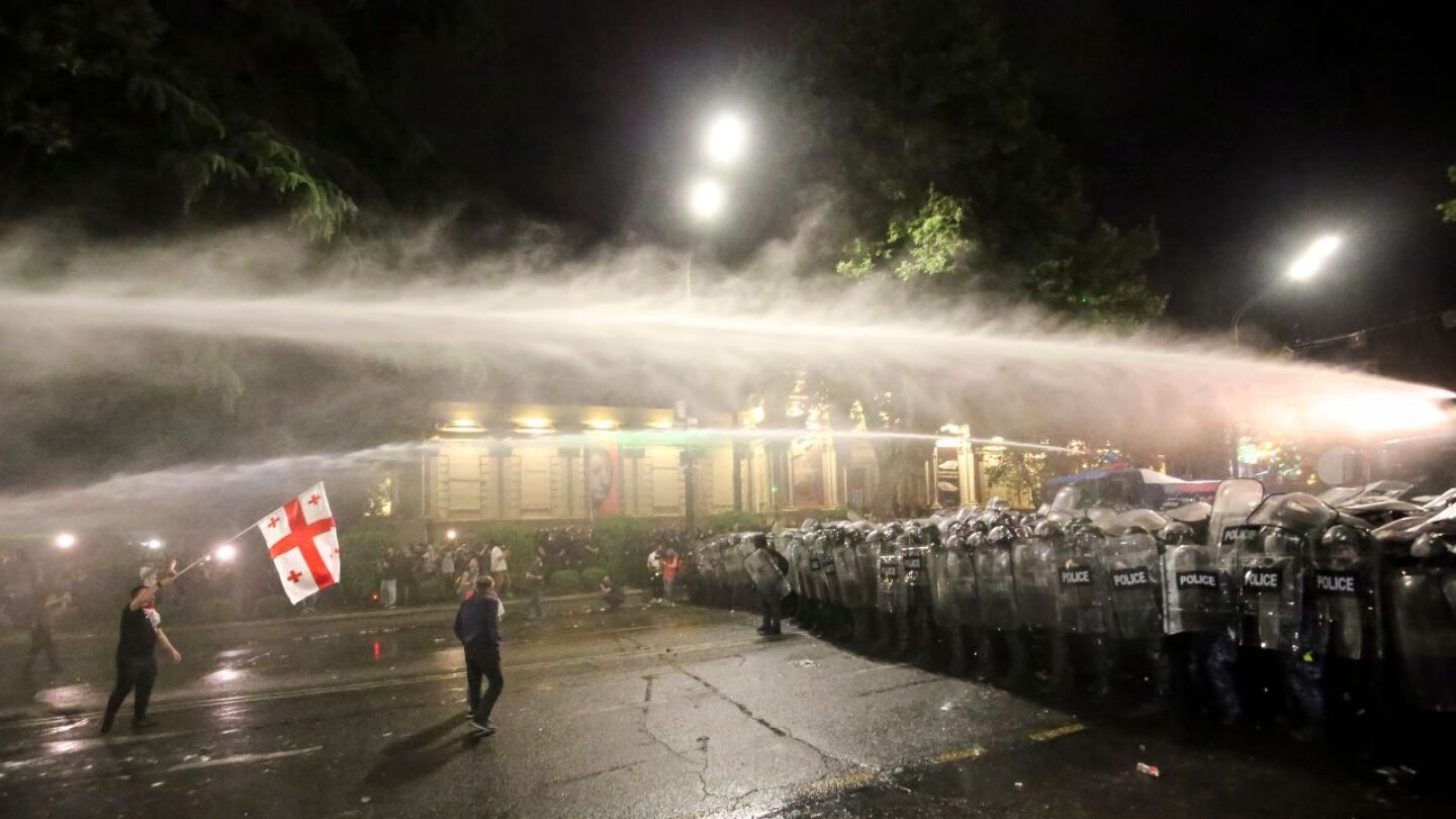 Georgian police use water cannons to try to disperse Tbilisi protest crowd