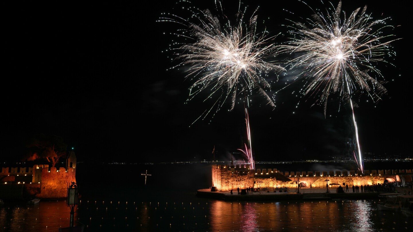 AP PHOTOS: Greek Orthodox mark Good Friday with solemn bier processions