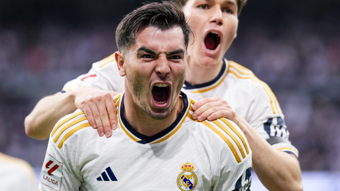 Real Madrid wins its record-extending 36th Spanish league title after Barcelona loses at Girona