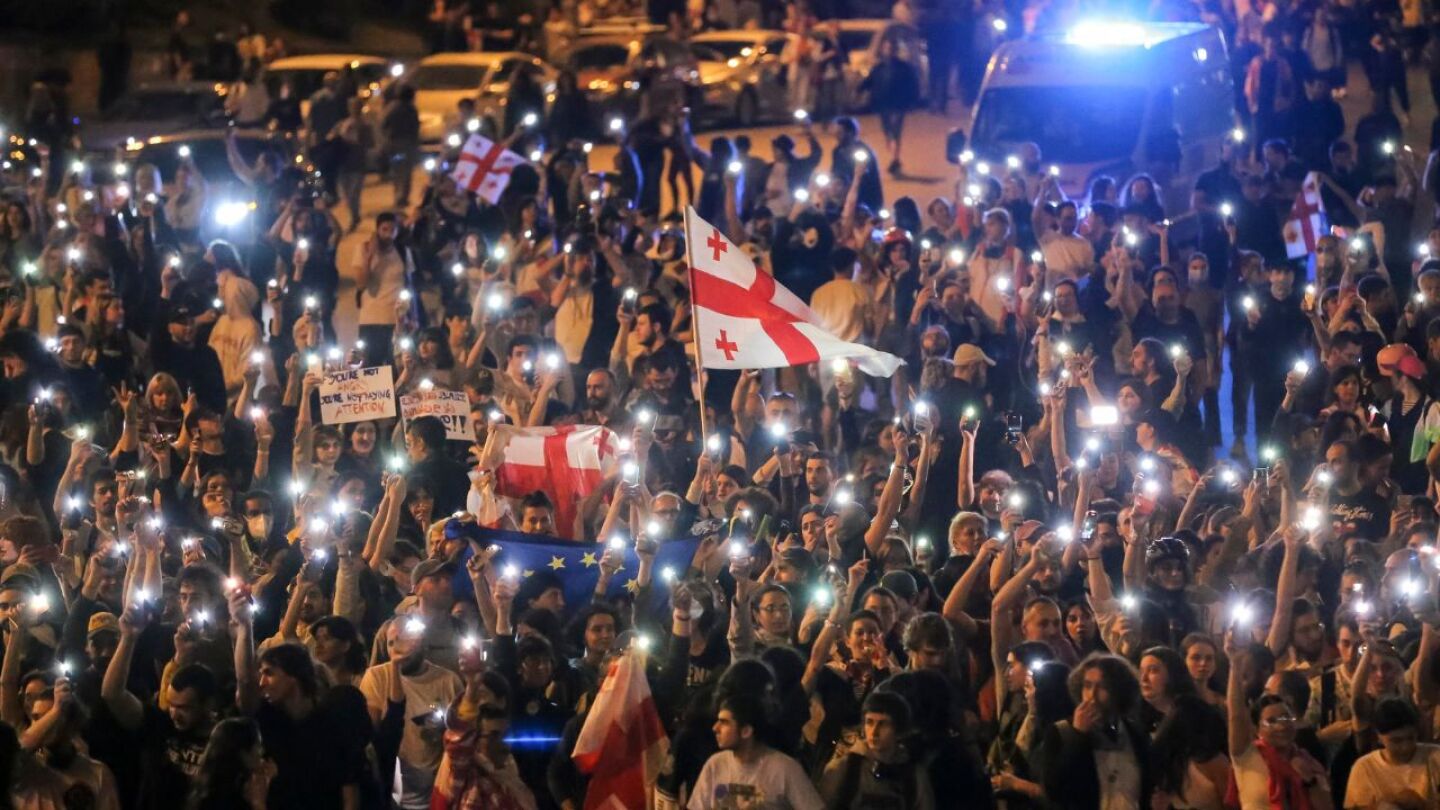 Georgian protesters against ‘Russia-style’ media law mark Orthodox Easter with candlelight vigil