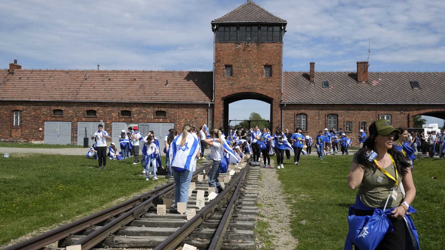 The yearly memorial march at the former death camp at Auschwitz overshadowed by the Israel-Hamas war