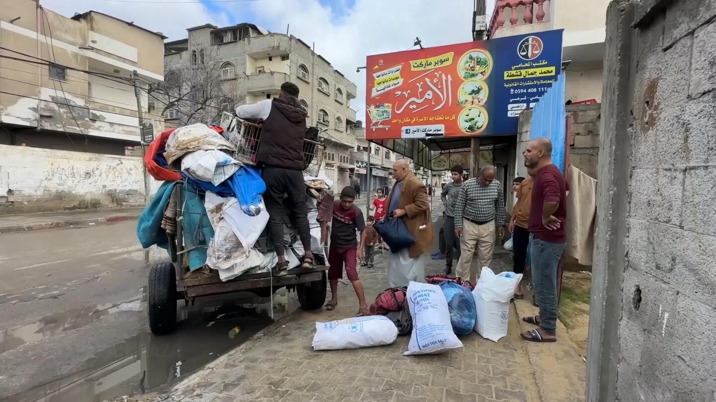 People prepare to leave after Israeli military orders evacuation of parts of Rafah | AP News