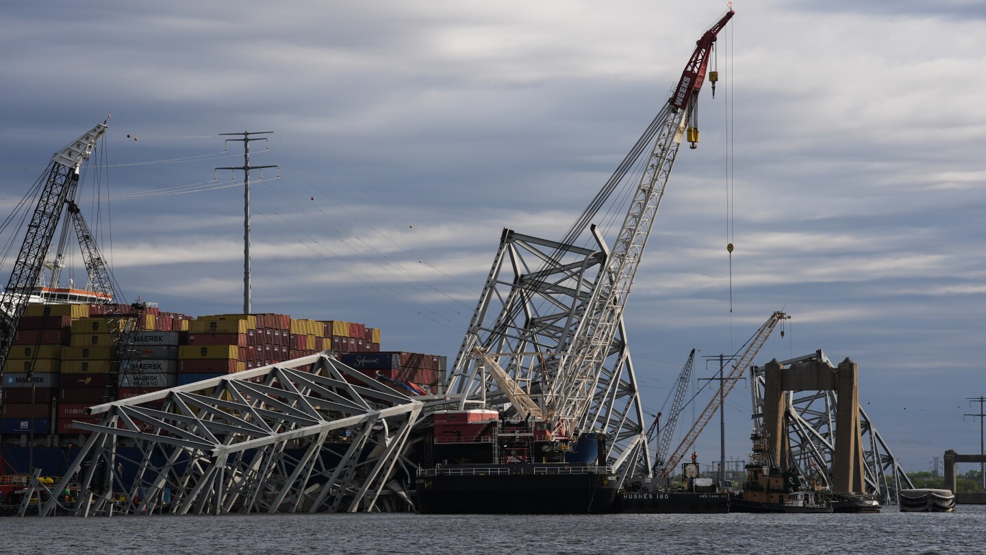 Dali crew will stay on board during controlled demolition to remove fallen bridge from ship’s deck