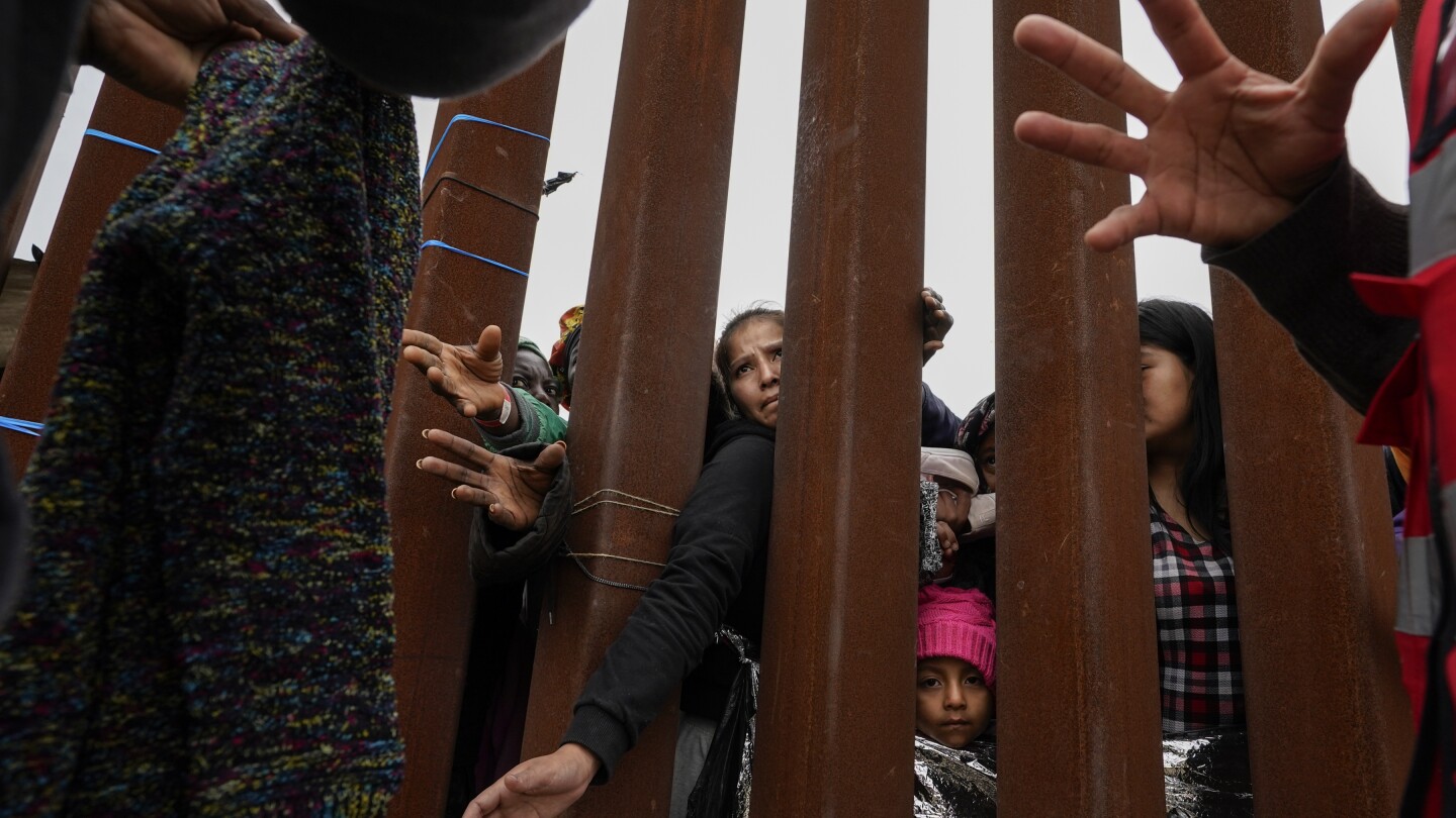 An AP photographer covers the migrant crisis at the border with sensitivity and compassion