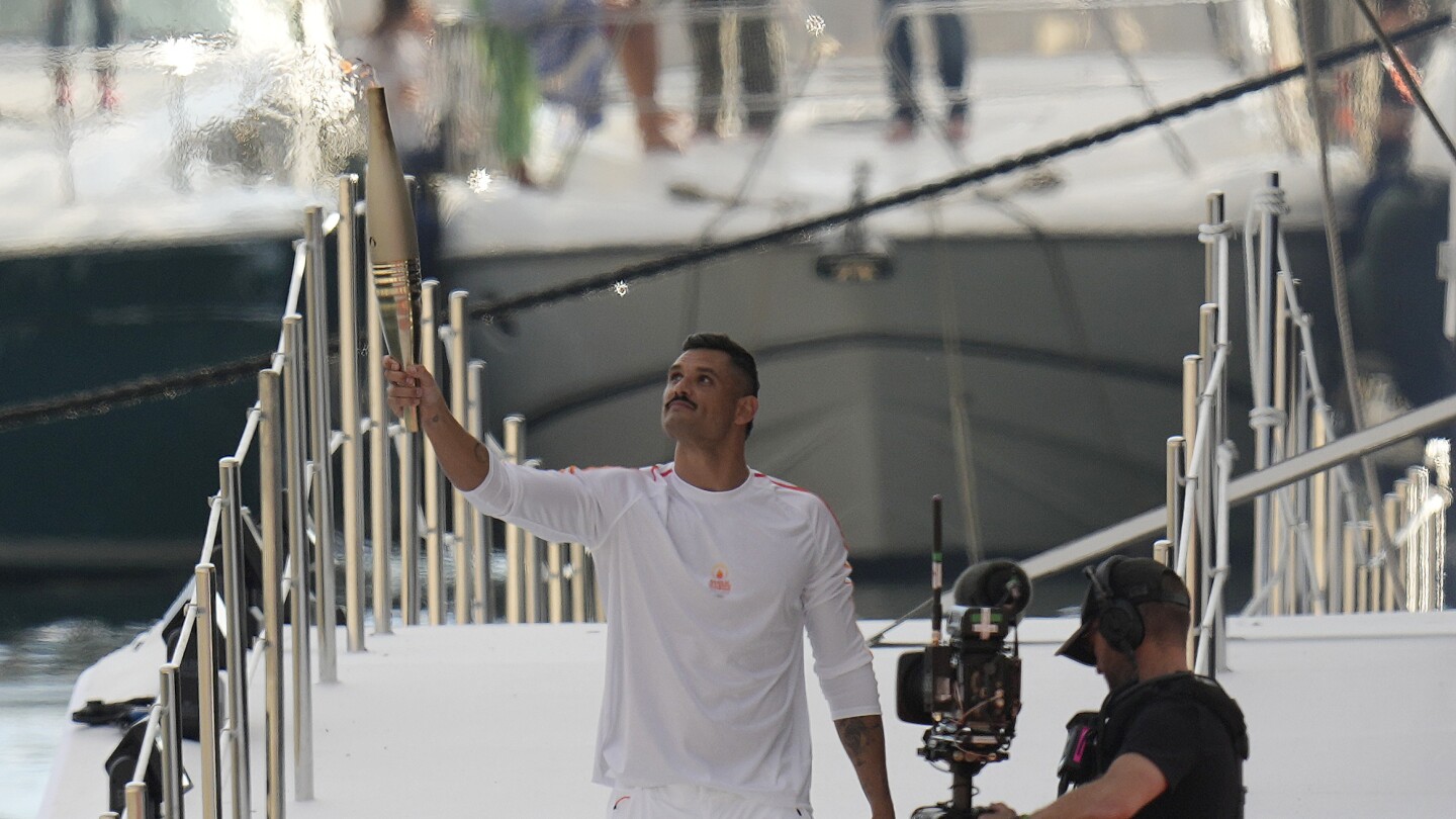 Torchbearers in Marseille kick off the Olympic flame’s journey across the country