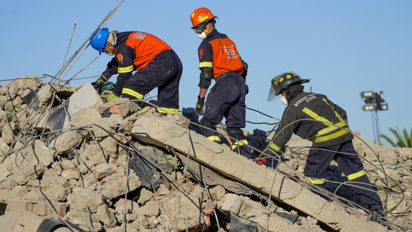 Hopes are fading for 44 workers still missing days after South Africa building collapse; 9 are dead