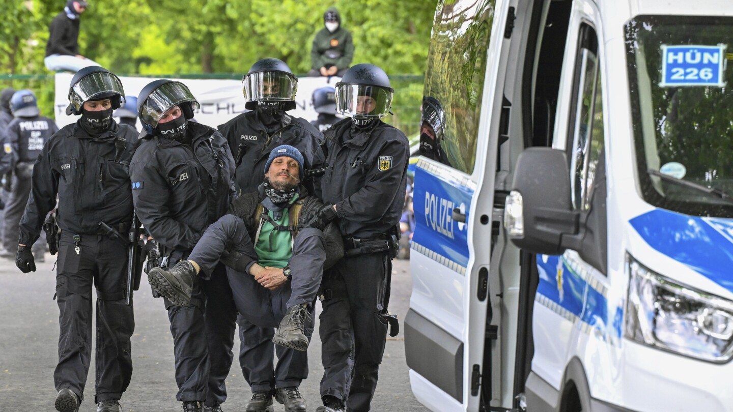 Police prevent environmental activists from storming Tesla factory in Germany