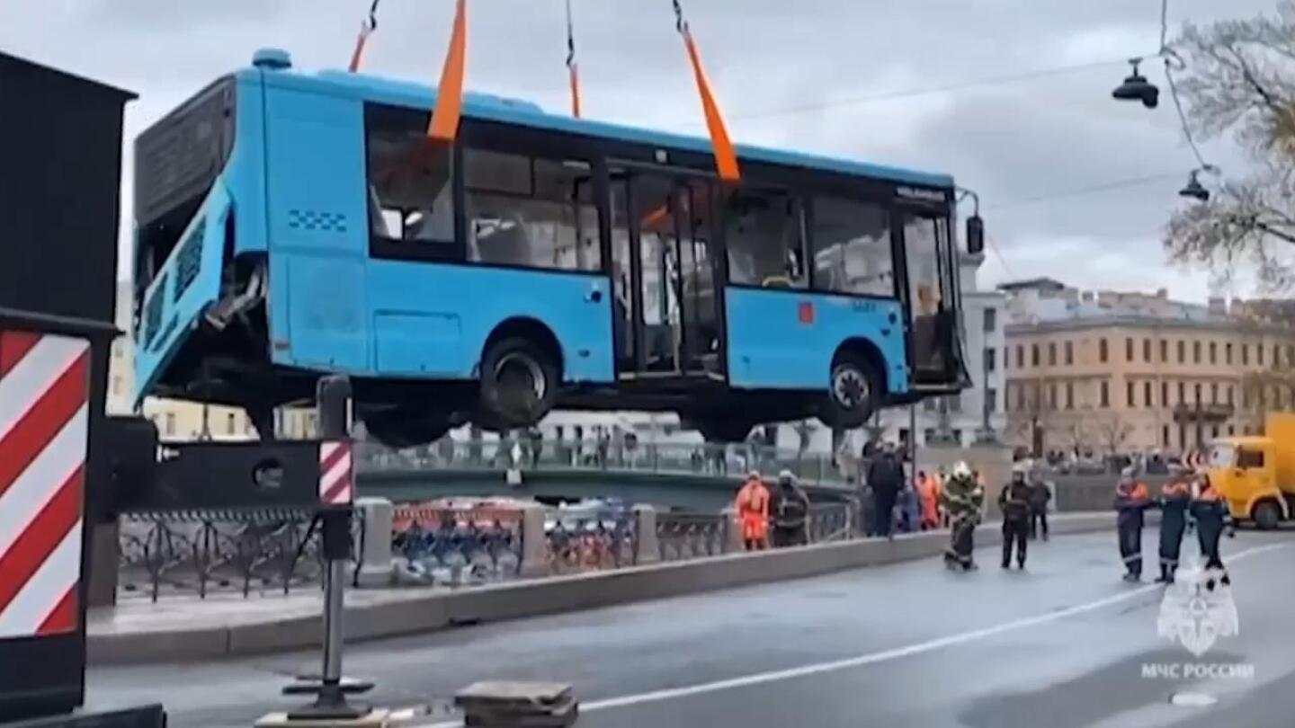 Bus lifted out of St Petersburg river after deadly crash which killed at least three | AP News