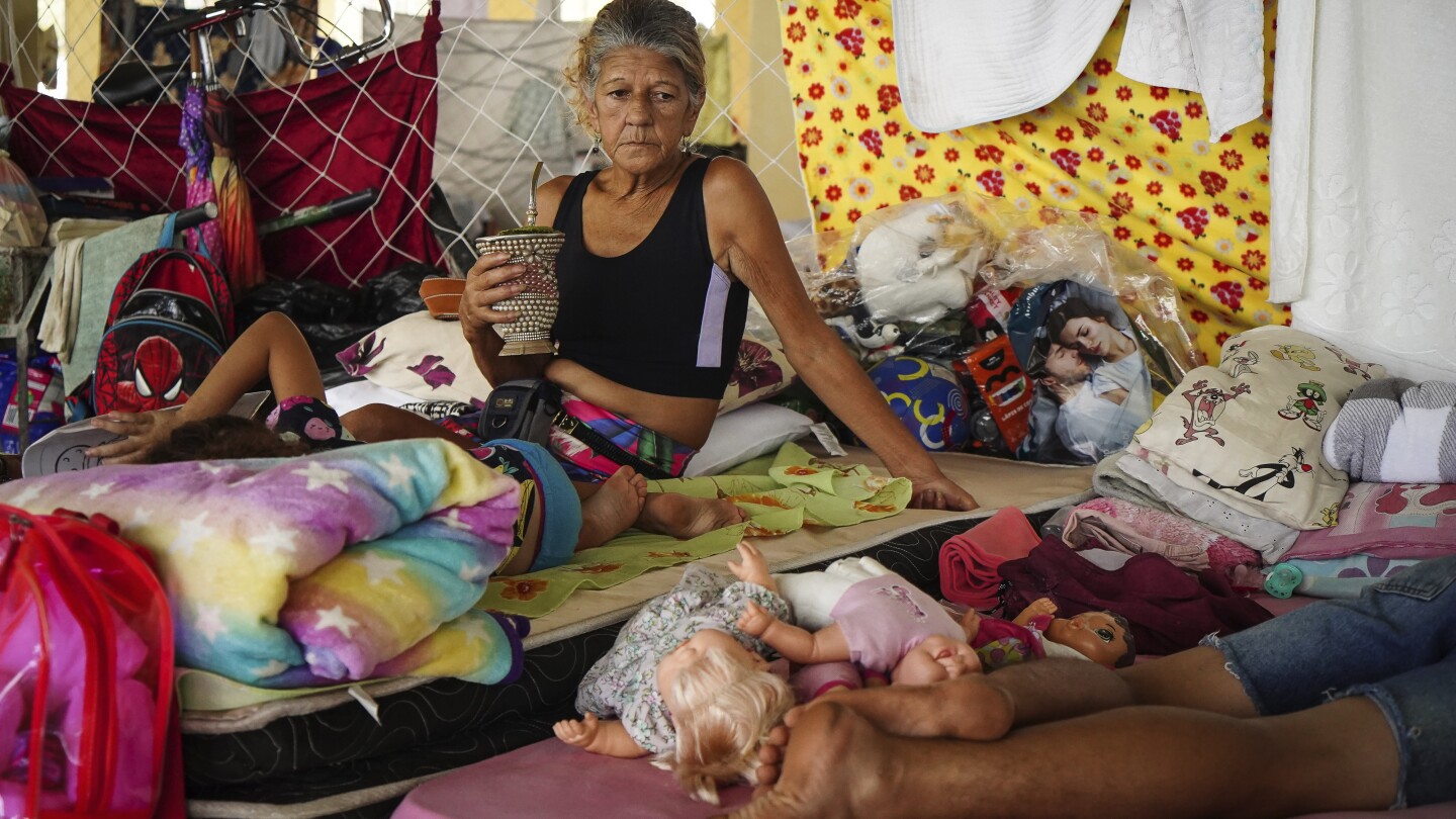 Flooding forecast to worsen in Brazil’s south, where often only the poor remain