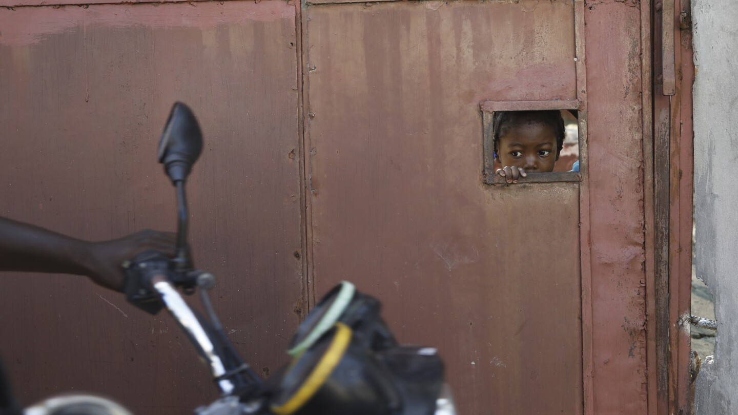 Haitians demand the resignation and arrest of the country’s police chief after a new gang attack