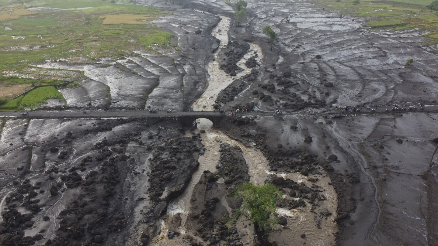 More bodies found in Indonesia after flash floods killed dozens and submerged homes