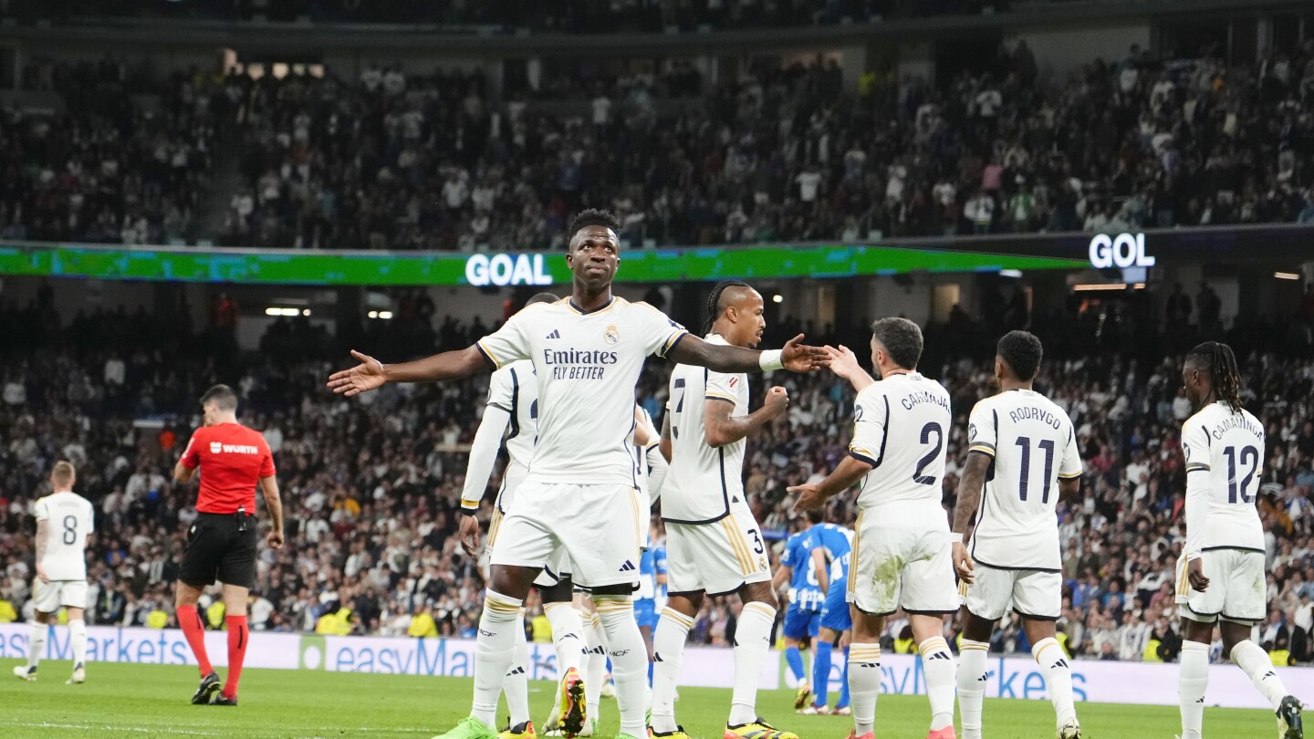 Real Madrid presents Spanish league trophy to fans and then routs Alaves 5-0