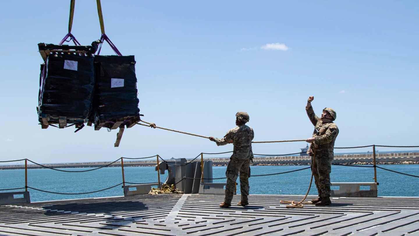 The Latest | U.S.-built pier begins carrying aid to Gaza