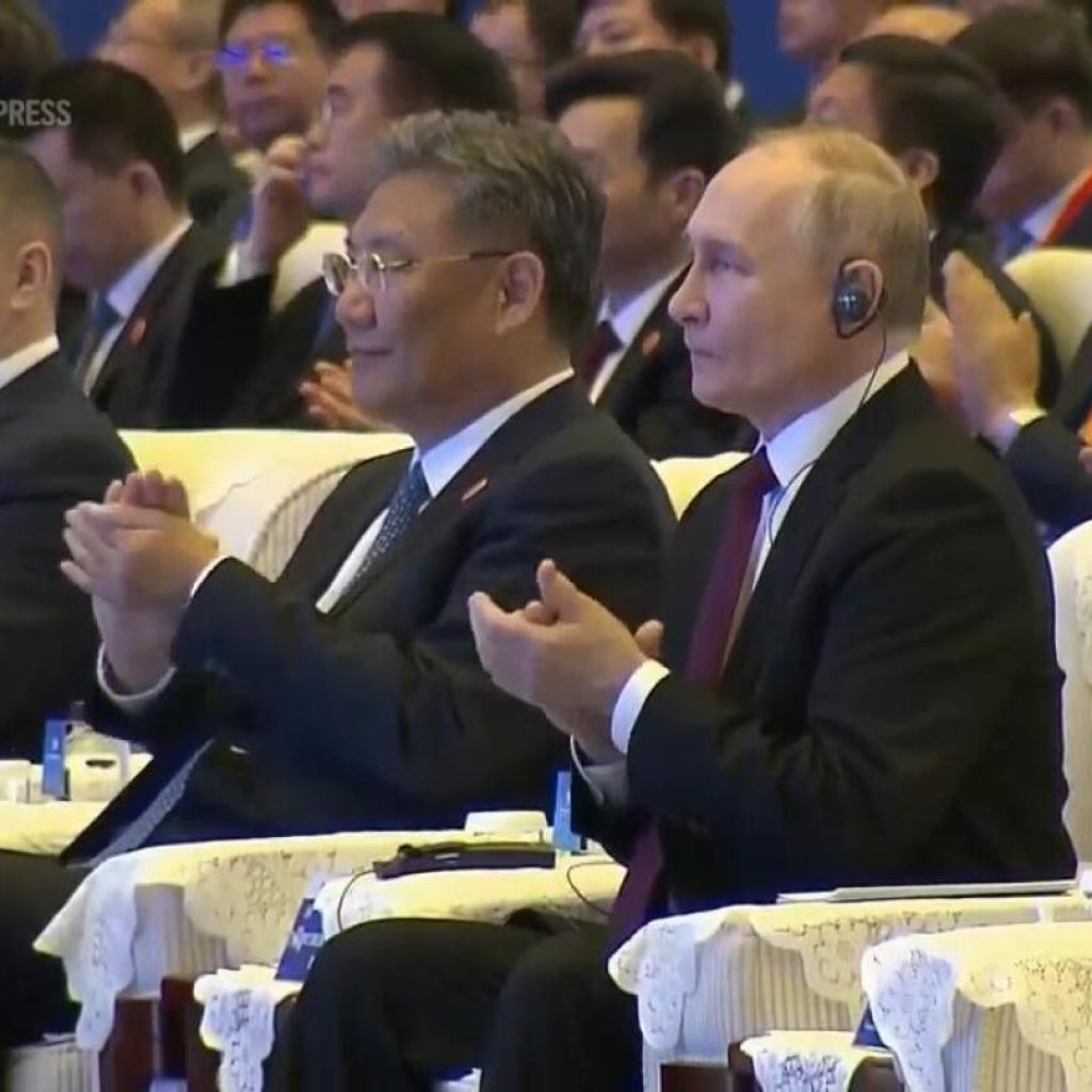 Putin addresses Russia-China Expo event, touts success of joint industrial projects | AP News