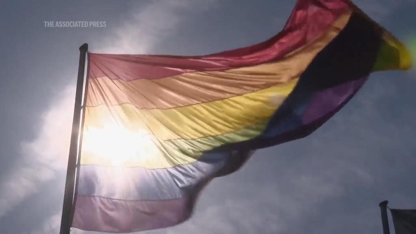 German Chancellery flies rainbow flag on day opposing violence against LGBTQ+ community | AP News