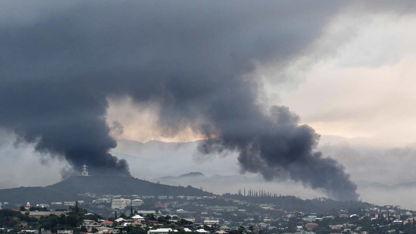 How is the violent unrest in New Caledonia impacting global nickel prices?