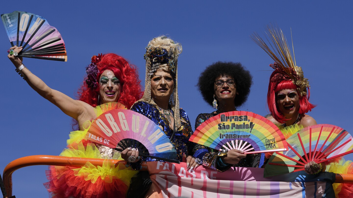 Gay pride revelers in Sao Paulo reclaim Brazil’s national symbols