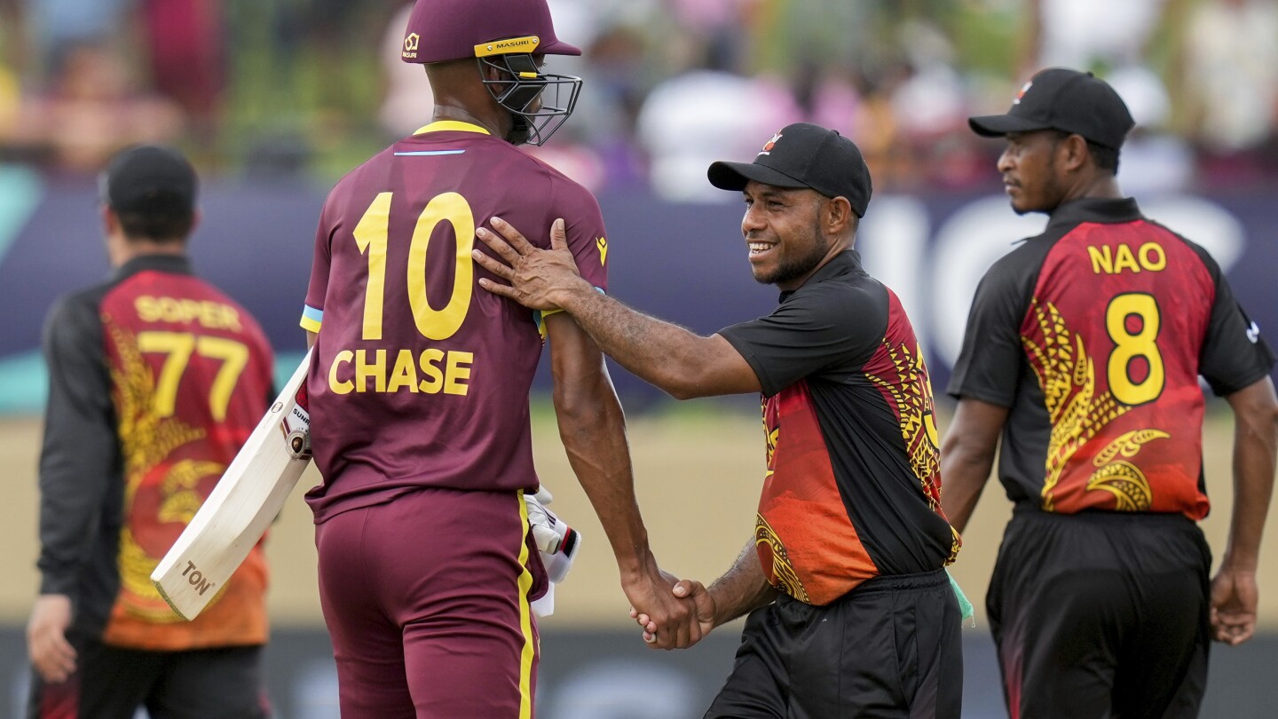 West Indies opens its Twenty20 Cricket World Cup with a 5-wicket win over Papua New Guinea
