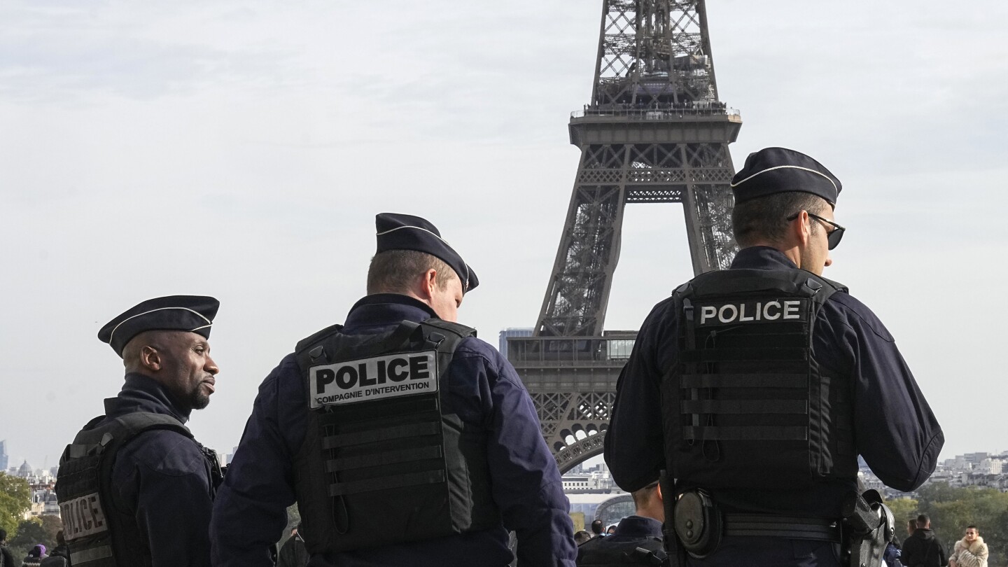 A Paris judge questions 3 men suspected of ‘psychological violence’ at Eiffel Tower