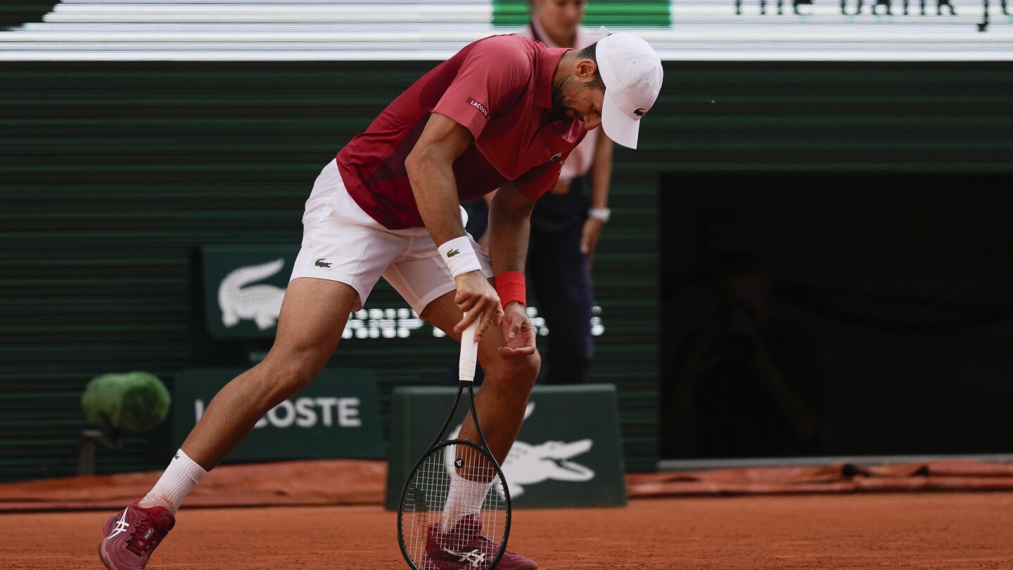 Novak Djokovic wins his record 370th Slam match but isn’t sure he can continue at the French Open