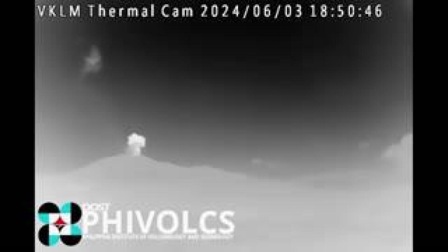Kanlaon volcano belches plume of ash and steam three miles into night sky | AP News
