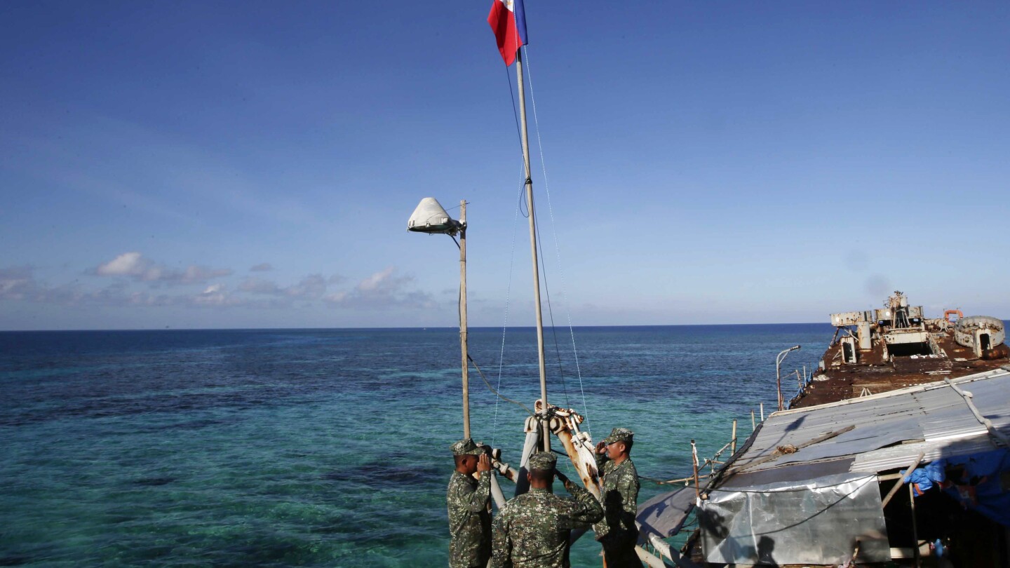 Philippines says China coast guard seized food dropped by plane for Filipino forces in disputed sea