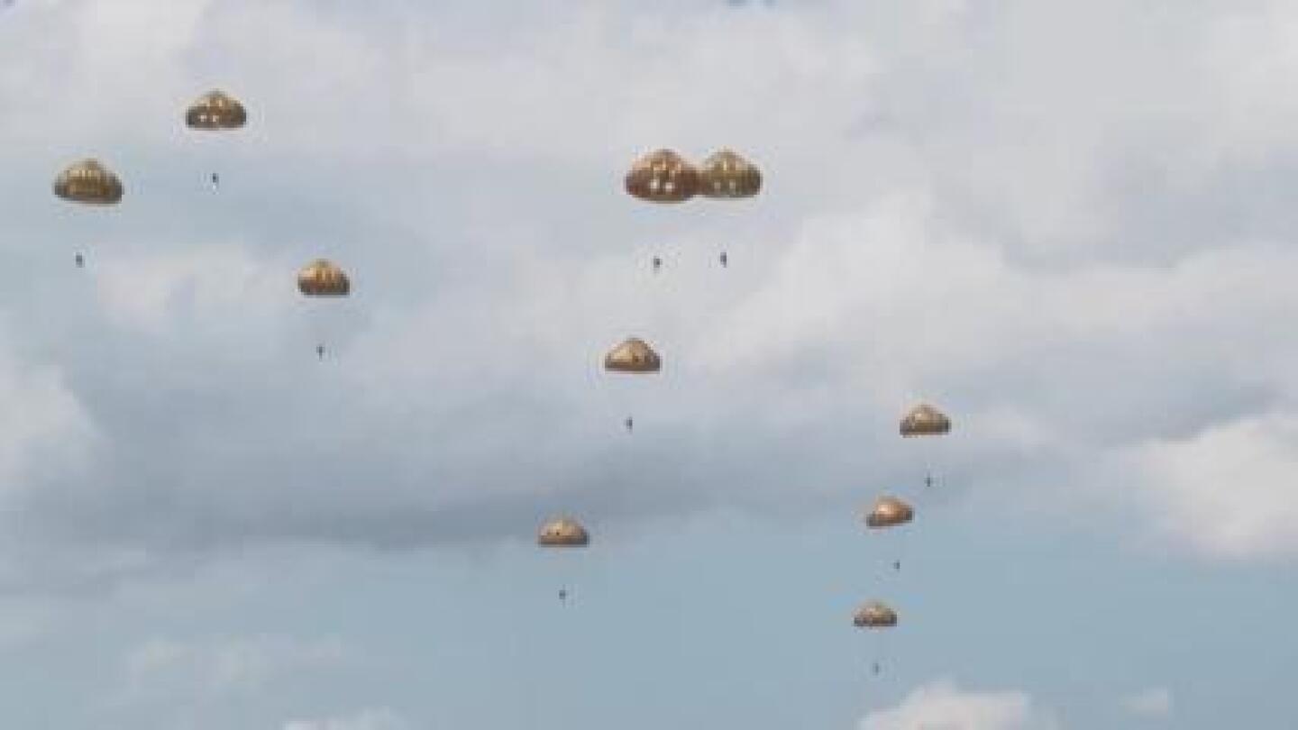 UK paratroopers jump into D-Day drop zone to recreate airborne liberation of Normandy 80 years ago | AP News