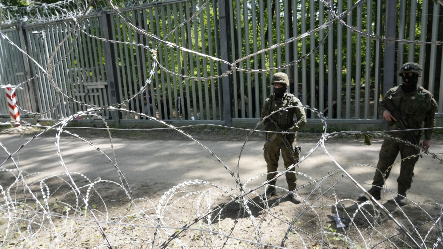Polish leaders seek clarity on detention of troops who fired warning shots under migrant pressure