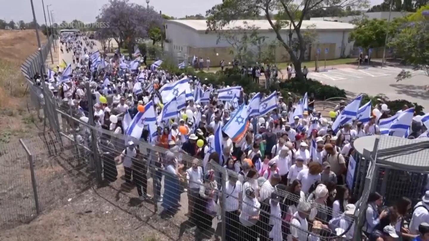 Israeli settlers in occupied West Bank emboldened not deterred by international sanctions | AP News