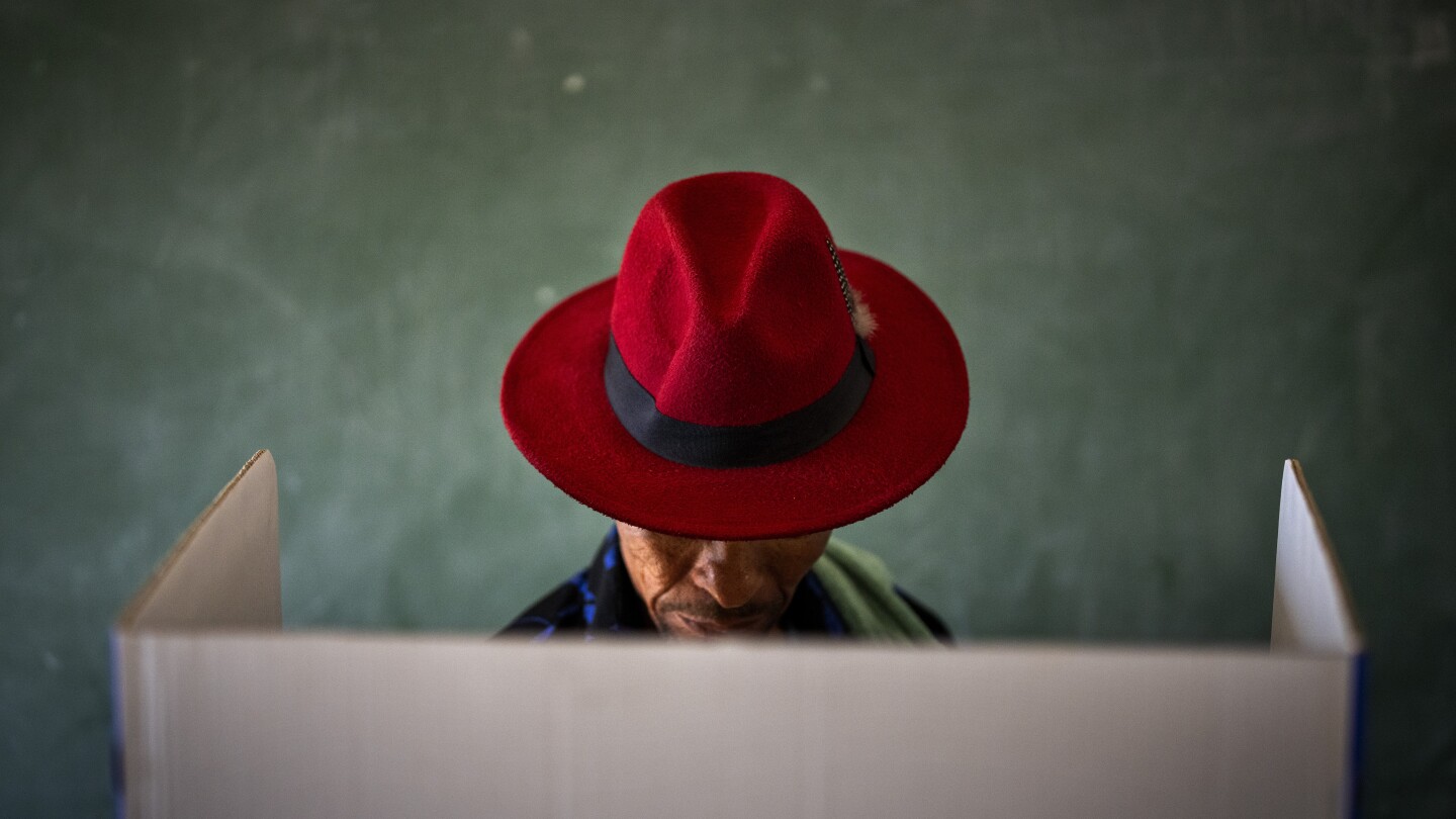 Here’s how an Associated Press photographer found the extraordinary in a red hat