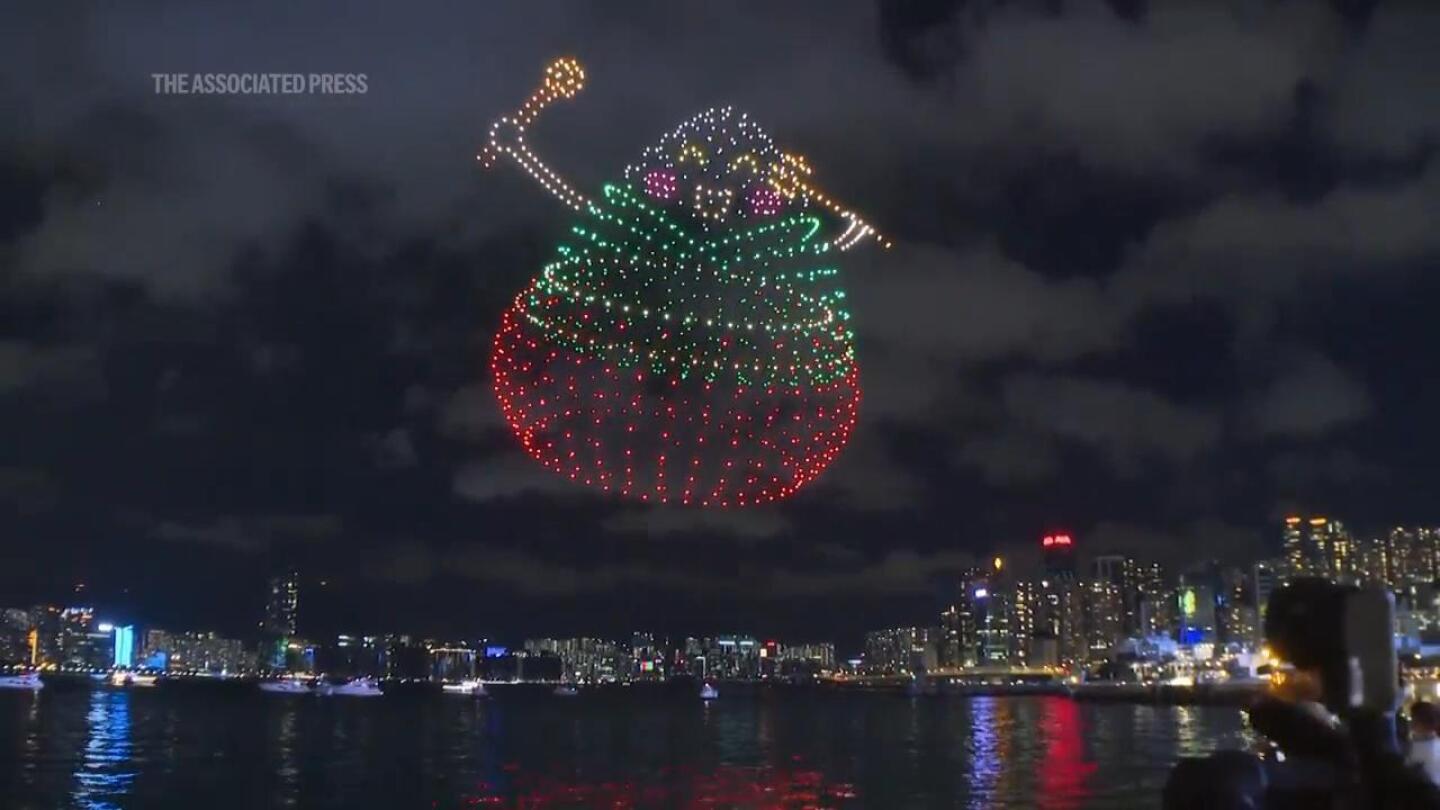 Drones light up Hong Kong sky to mark Dragon Boat festival | AP News