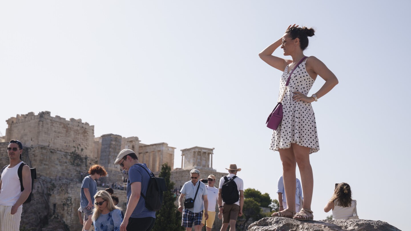 Heat wave in Greece halts visits to Acropolis as drones with thermal cameras monitor temperatures