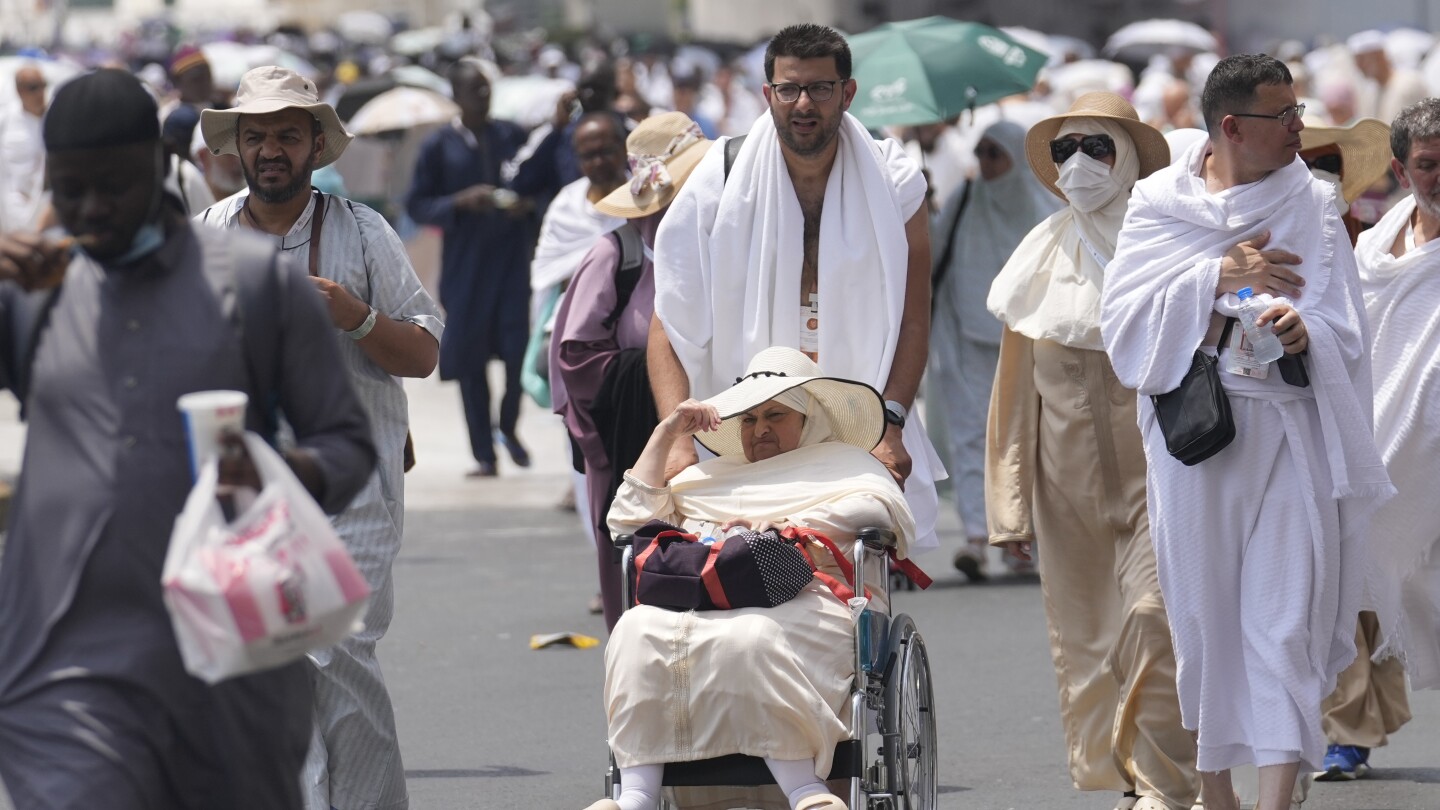 Masses of pilgrims in Saudi Arabia circle the Kaaba ahead of the official beginning of the Hajj