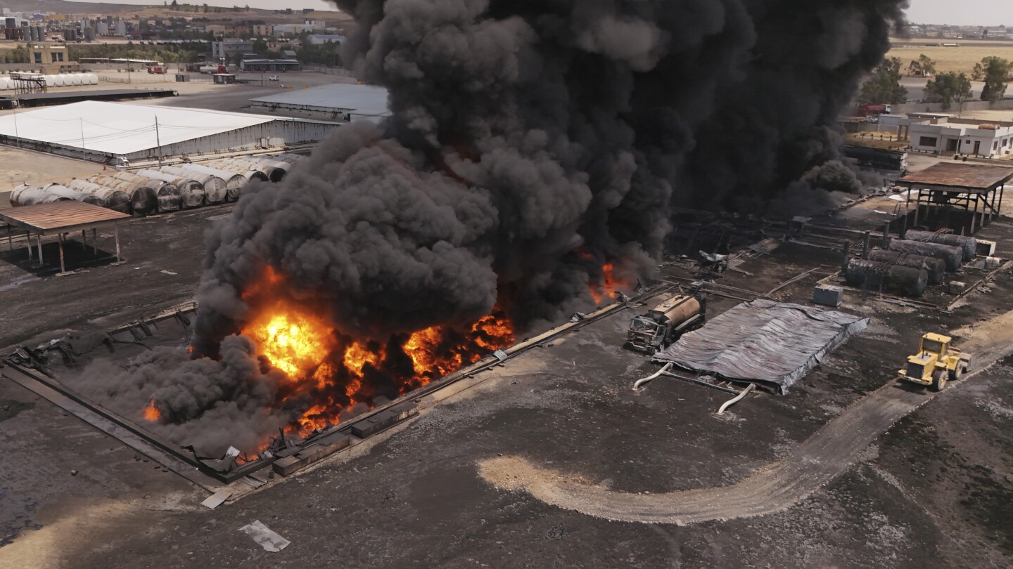 Firefighters battle massive fire at northern Iraq oil refinery