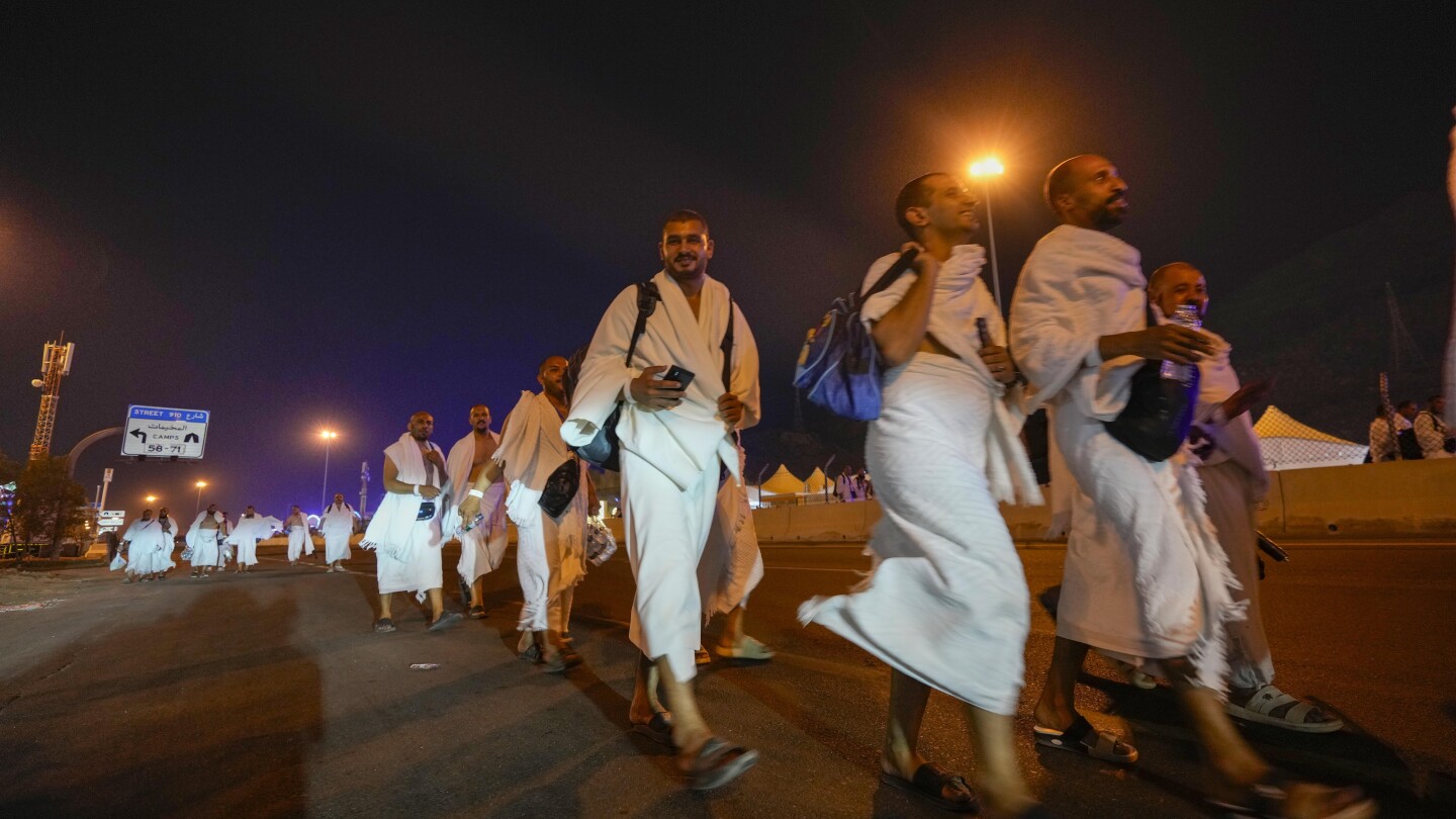 Muslim pilgrims converge at Mount Arafat for daylong worship as Hajj reaches its peak