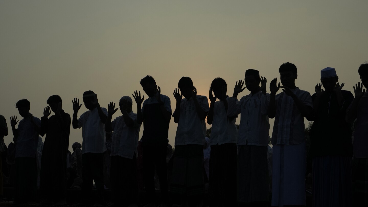 Muslims in Asia celebrate Eid al-Adha with sacrifice festival and traditional feast