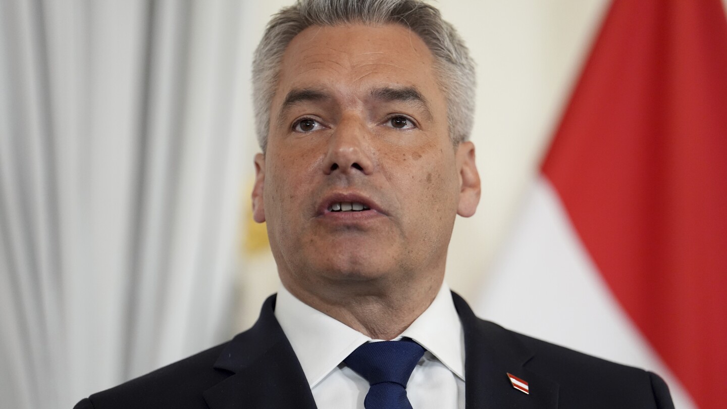 Austrian chancellor to remain in government coalition despite his minister’s controversial EU vote