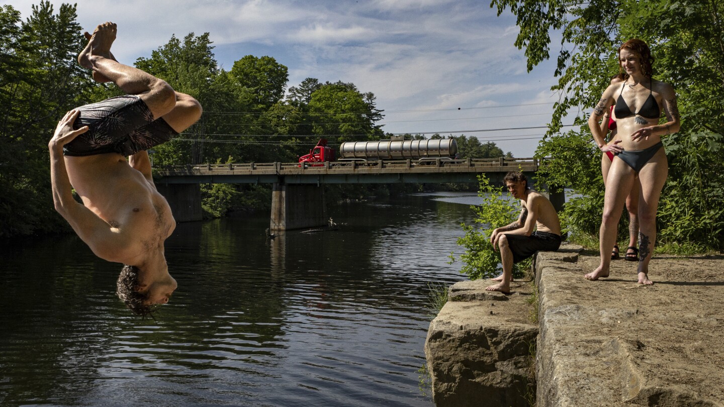 Millions sweating it out as heat wave nears peak from Midwest to Maine