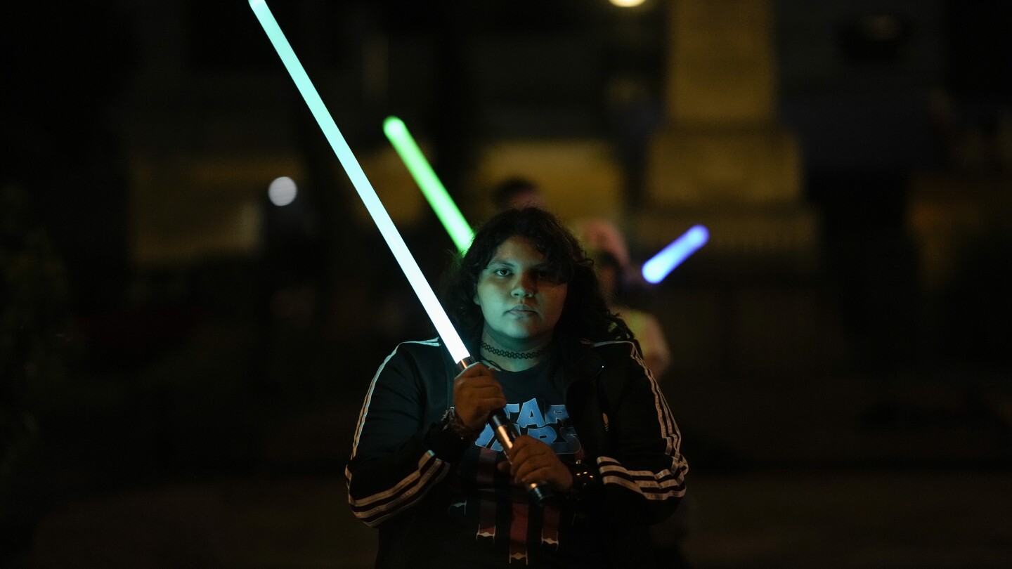 Star Wars fans hone their lightsaber dueling skills at a Mexico City Jedi academy