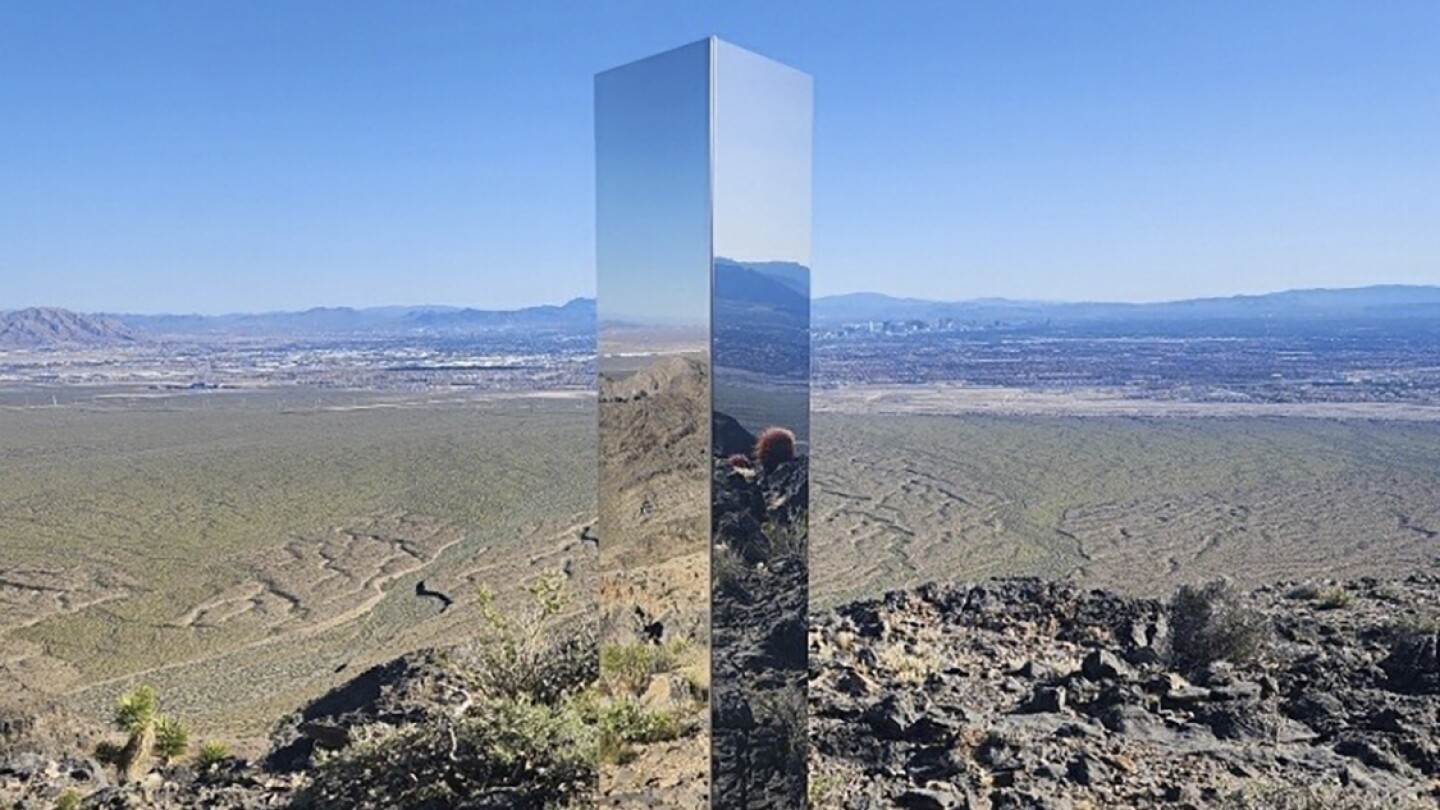 Shiny monolith removed from mountains outside Las Vegas. How it got there is still a mystery