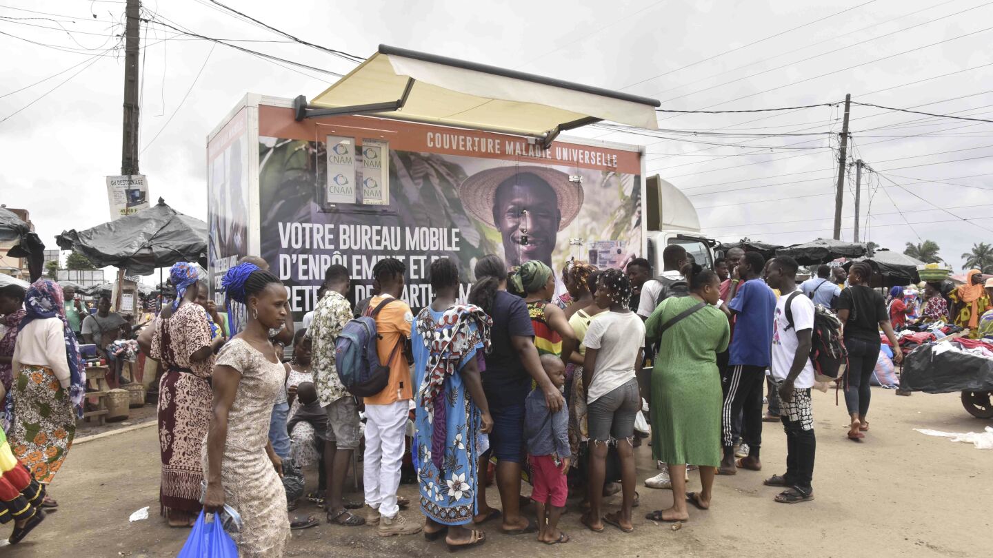 Ivory Coast sets up mobile enrollment for a health coverage program criticized over glitches