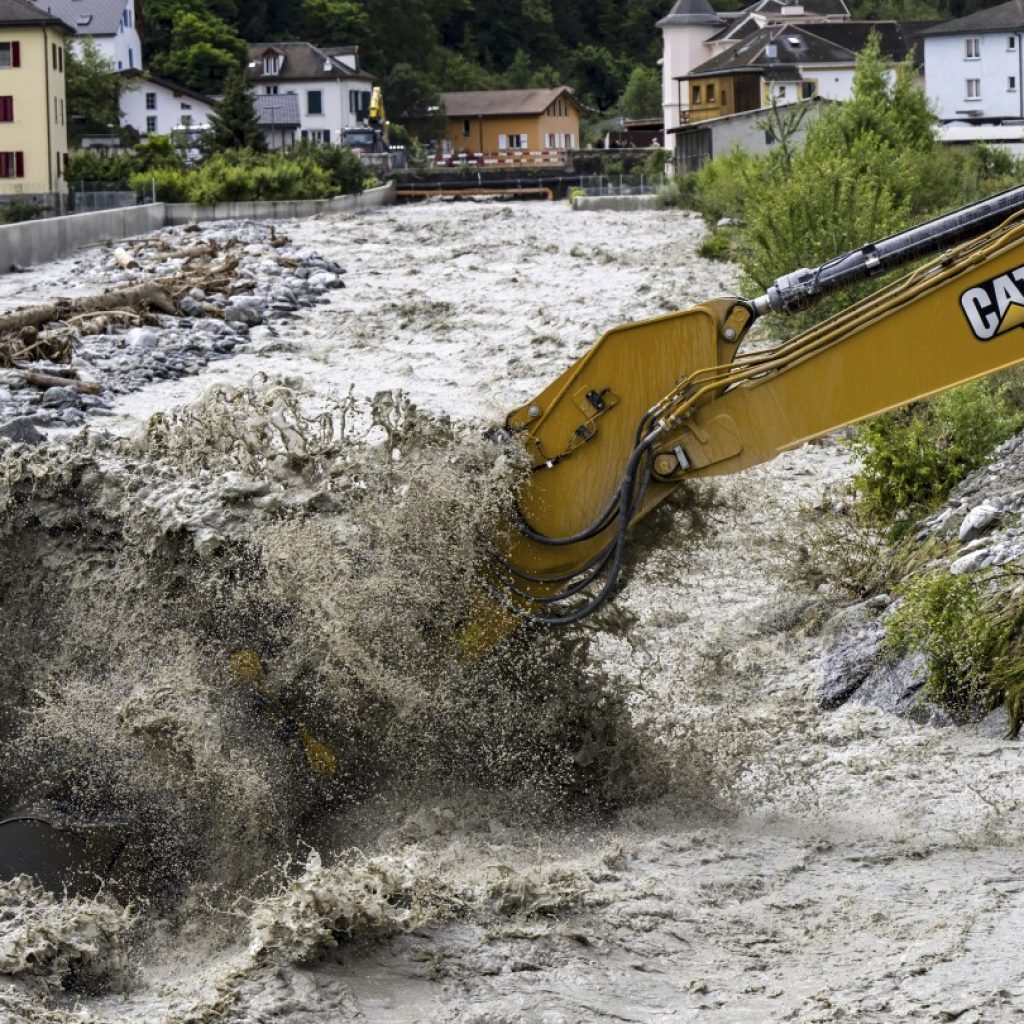 3 missing in a landslide in Swiss Alps as heavy rains cause flash floods