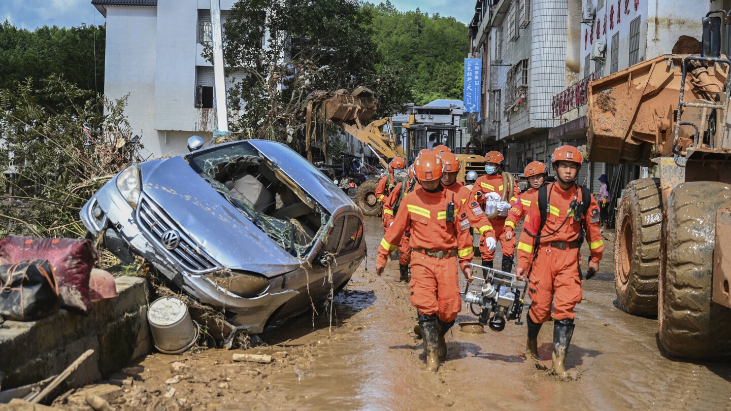 Rescuers find family of 6 dead in landslide in eastern China, as severe weather warning extended