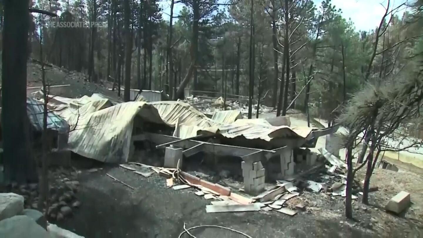 Team combs fire-ravaged New Mexico community for remains of the missing | AP News