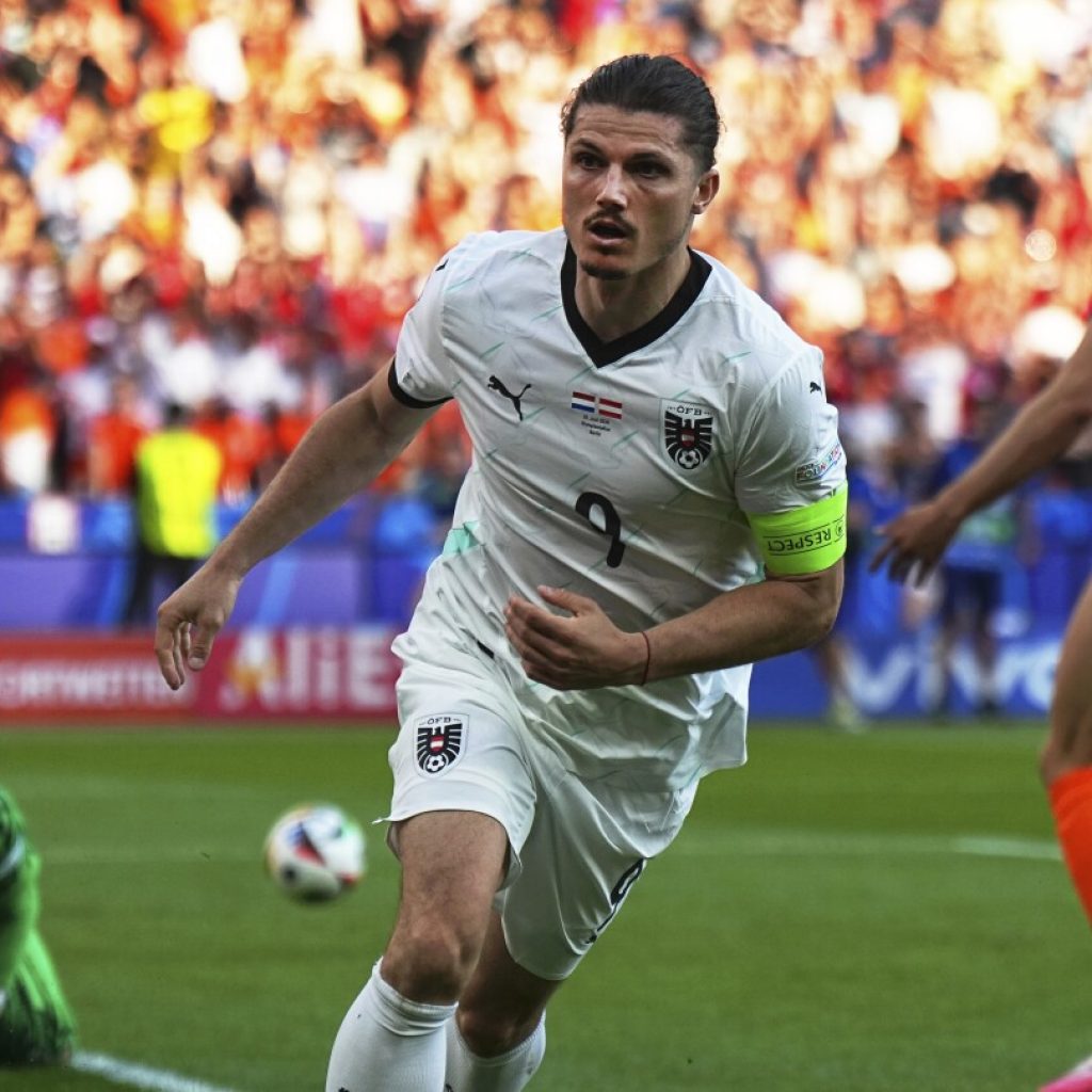 Austria beats Netherlands 3-2 to reach knockout stage of Euro 2024 as group winner ahead of France